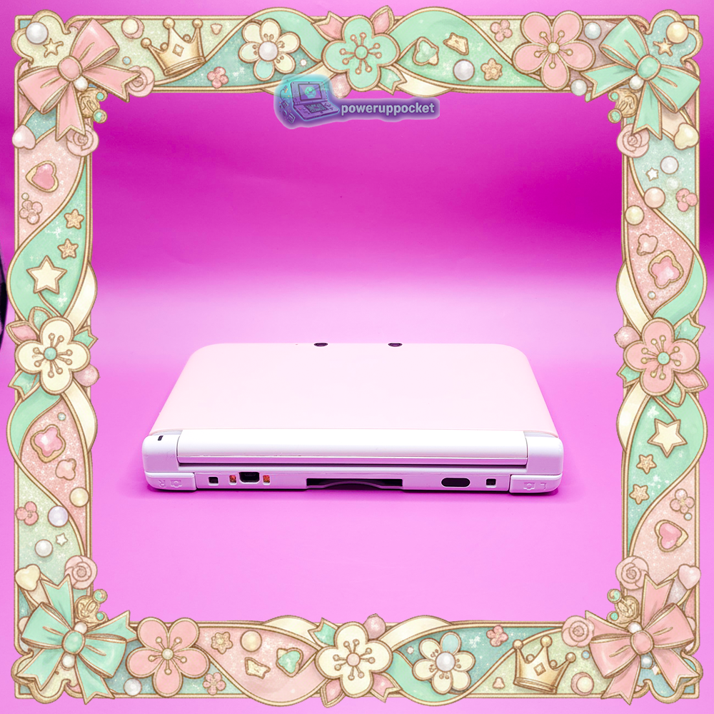 Back view of a custom Nintendo 3DS XL with pink shell, showing the back plate, rubber feet, and overall condition.